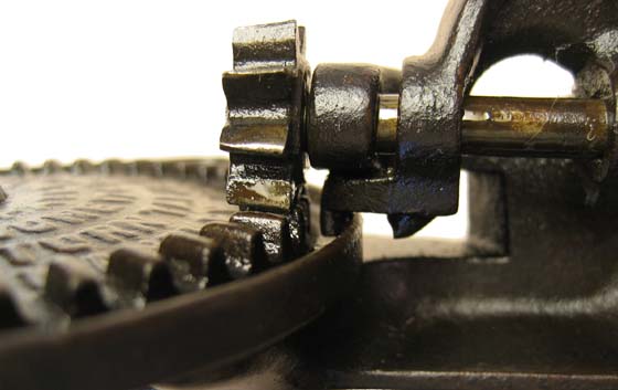 Wedge-shape structure to help guide split frame along the turntable track.  This wedge is a part of the casting, unlike the pin shown above.